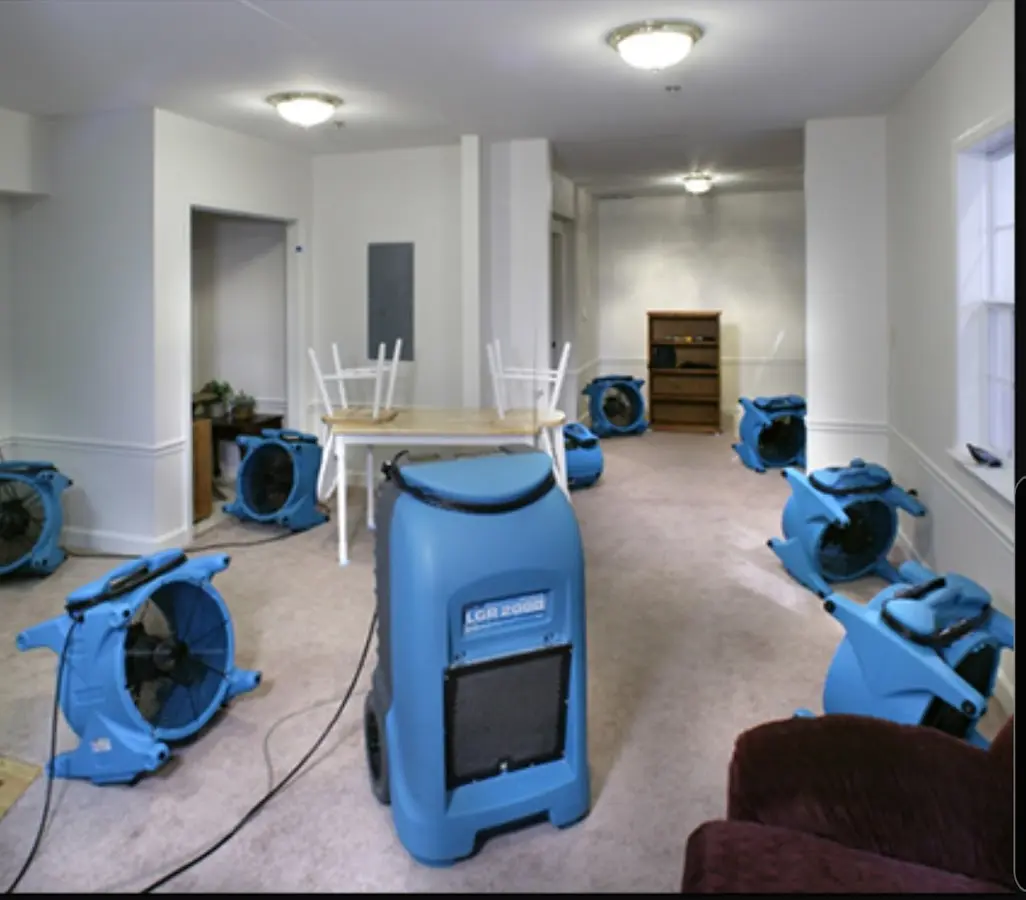 Air movers and dehumidifier setup for Water Damage Restoration in Rodeo